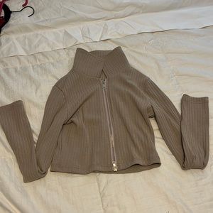 Cropped Long sleeve light tan zip up shirt